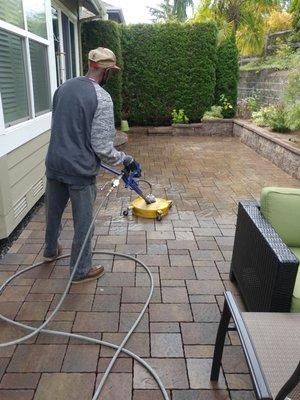 Pressure washing a stamped concrete patio