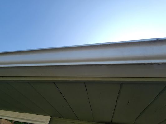 Cleaning the face of the gutters in Edmonds WA.