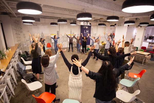 Participants getting warmed up with their power posing!