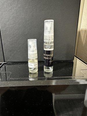 White label is the "5ml" bottle from perfumes de France and to the right, the actual bottle with 5ml sample.