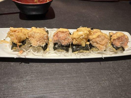 The wasabi crackers appetizer with crunchy tuna, crunchy crab and crunchy salmon.