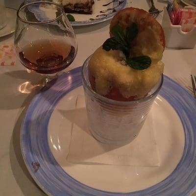 Amaretto and an Orange Sorbet in a natural fruit bowl.