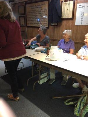 The ladies selling the dinner tickets