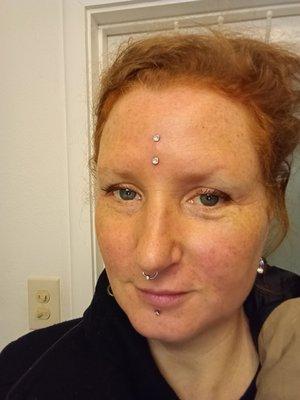 Forehead surface-barbell;  septum;  labret.