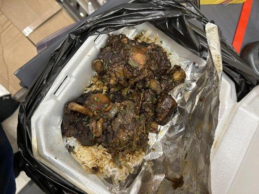 Oxtail with rice and red beans and rice with yams and fried chicken