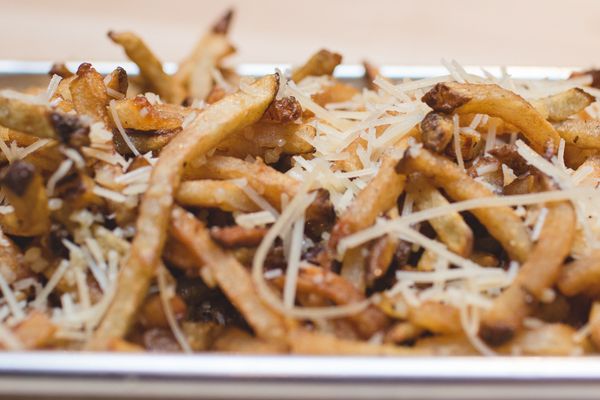 Did you know you can upgrade your side of fries to Garlic Fries?  Fresh, hand cut, and seasoned with Mammoth seasoning, garlic, and parm.