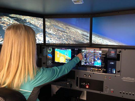 Nighttime approach in the Redbird Flight Simulator located in Norwood Ma at Wings Level Aviation Group