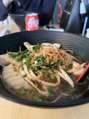 Gyozilla - Shio Broth, Pork Gyoza, Scallions, Daikon radish, Cilantro, Egg, Onion Crisps and Fish cake