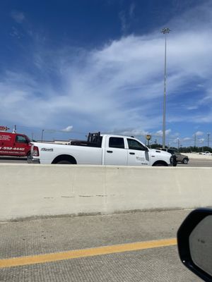 Shows he's in a company truck trying to run people off the road......