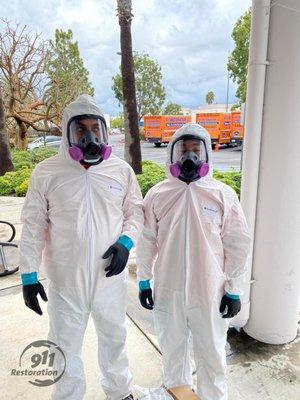 Two Techs in Hazmat Suits