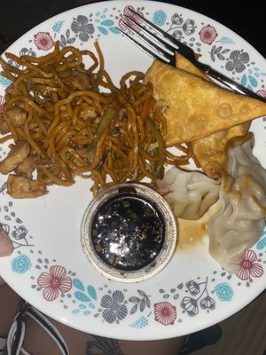 Counter clockwise, from left; Chicken lo mein, crab Rangoon, steamed dumplings, dumpling sauce.  Deliver, plated at home.