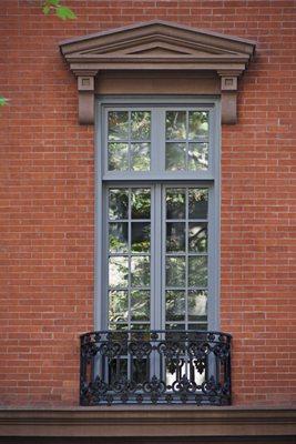 Obtained NYC Landmark Permit. Furnished and Installed custom wood windows to replicate the fine historical details.