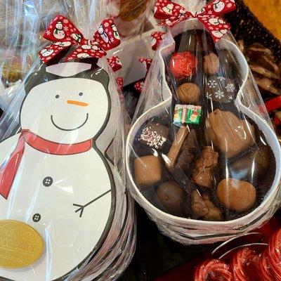 Handmade chocolate in a snowman box.