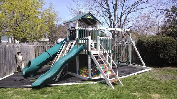 King Swing Vinyl Launching Pad 3 swing positions split deck 6 x 8 2 slides rock wall, stairs and ball pits