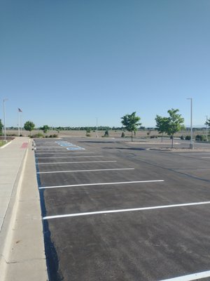 Parking lot painting and asphalt crack sealing in Littleton Colorado.