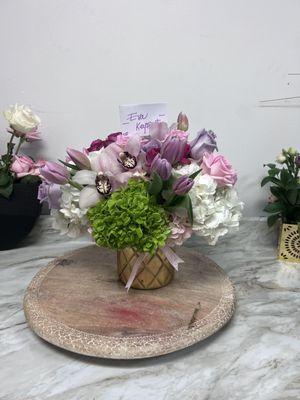 delicate balance of roses and orquids Cymbidium. $190.00