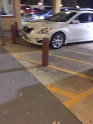 Parking in a handicap parking spot. With no handicap pass.