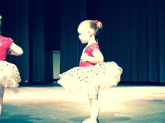 2 year old getting ready for stage rehearsals before the big winter performance