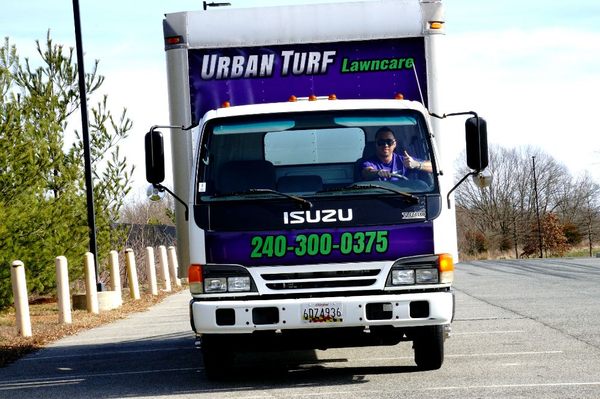 Urban Turf Lawn Care heading out to cut grass.