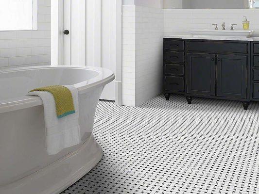 Our stock White with Black dot basket weave porcelain mosaic.