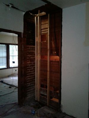 Took chimney out, framing in wall...