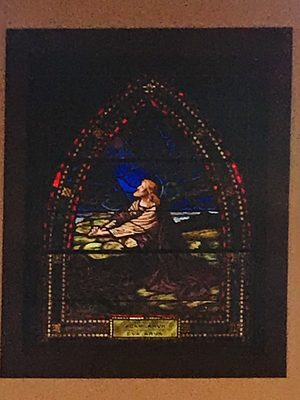 Stained glass above the enterance of the church