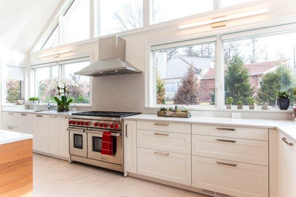 Leicht Kitchen in Great Neck, NY. Sub-zero / Wolf Appliances, Caesar stone countertop, Team7 Chairs, and bar stools.