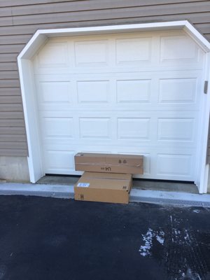 UPS DELIVERY DIRECTLY BEHIND GARAGE DOOR