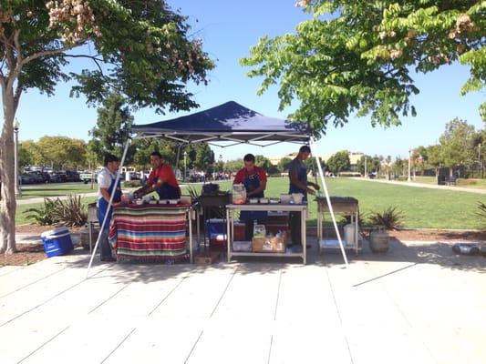 Guys from El Unico set up for an event. Savory beef and chicken tacos served hot with onions, salsa and guacamole. Terrific!