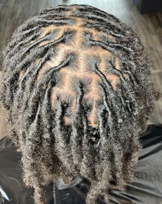 Traditional loc retwist