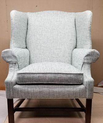 Wing back chair reupholstered.