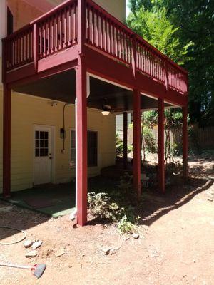 Underdeck gutter system. Fan install. Red SHERWIN WILLIAMS SUPERDECK solid stain.