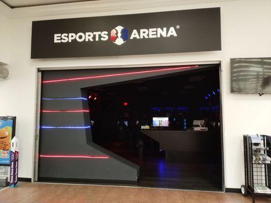 The entrance to EsportsArena located on the Home&Pharmacy entrance of Walmart Supercenter located at 3851 Airport Freeway