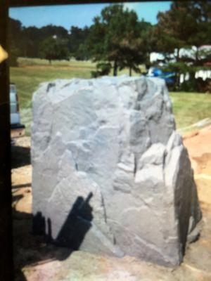 Large rock cover installed over well and large bladder tank!