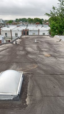 Old roof before a new rubber roof was installed.