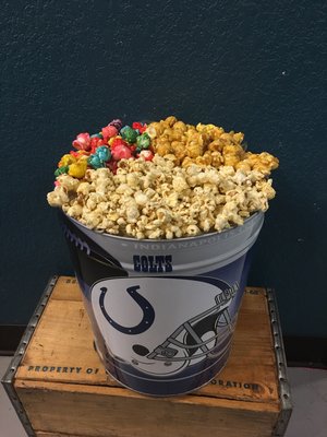 Colts popcorn tin filled with So West Jalapeño, Cornfetti, & Caramel!