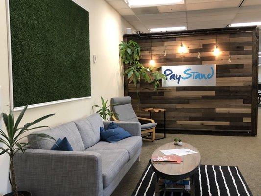 Paystand's lobby area. The company has since updated its logo and is finalizing an office expansion with a new look and fee.