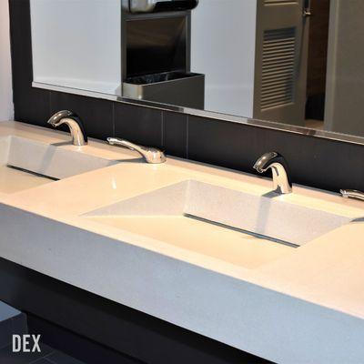 Check out this modern backslide sink made with our high-performance DEXterity polished concrete.