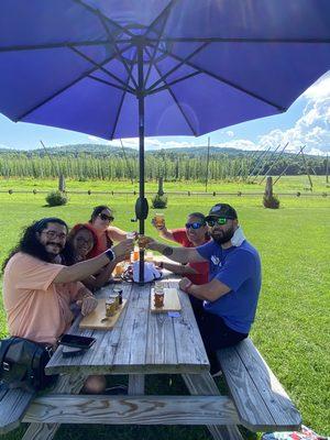 Here are some happy guests enjoying a flight at The Brewery at Four Star Farms just before our exclusive tour into the hop fields!