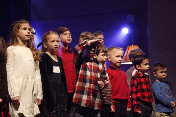 Kids ministry singing their away in the manger song during December services!