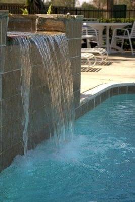 What's more relaxing than listening to a waterfall by the swimming pool?