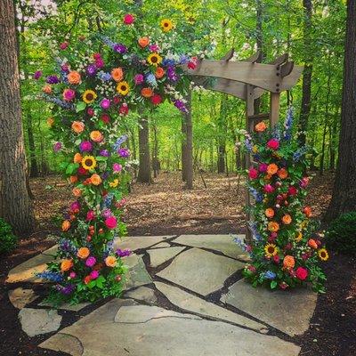 We LOVE to flower arches! This one is for the perfect August wedding!