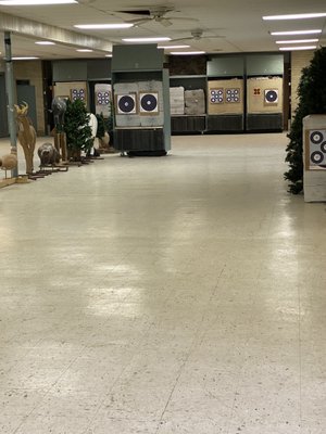 Indoor range with various targets and distances.