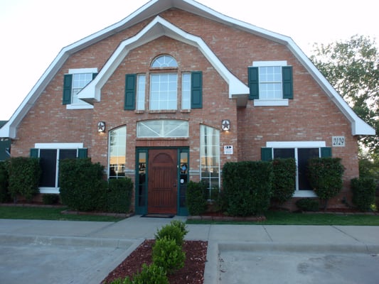 Gym entrance is on the left side of the building, 2nd floor