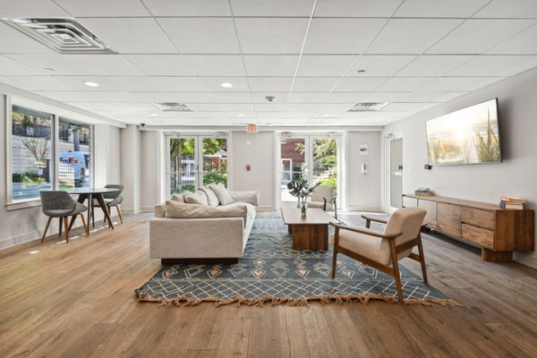 Resident community room with lounge seatings and TV