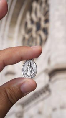 A little pendant of the Infant Jesus of Prague purchased from the book store.