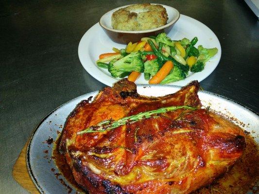 20oz-24oz Latin Rosemary Chop on 14" Oval, Veggie & Stuffed Potato