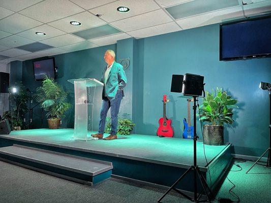 Voyage Church stage and Pastor preaching