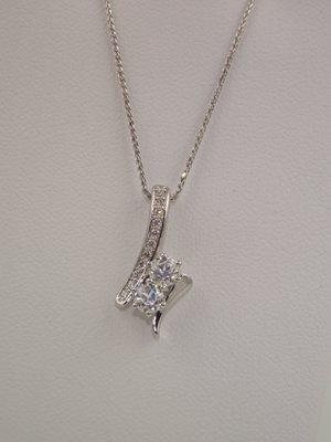 14k white gold, 2 stone diamond pendant. 0.63 TDW, 18' chain - $2,300