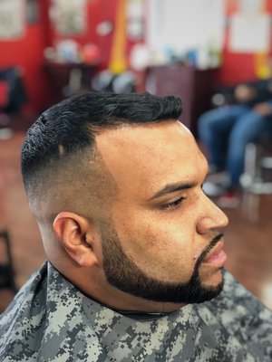 High Skin Fade with a Tapered Beard